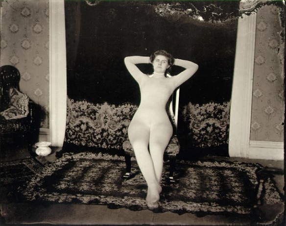 E.J. Bellocq's photograph of Storyville prostitute with full body stocking.
