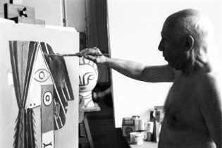 Pablo Picasso shirtless.