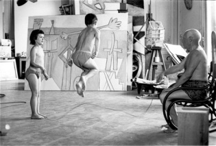 Pablo Picasso shirtless and skipping with kids.