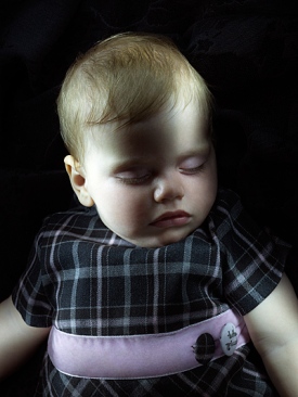 Baby model looks like Victorian post-mortem photography