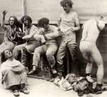 Photograph of six wax figures and broken body parts damaged from 1929 fire at Madame Tussaud's in London.