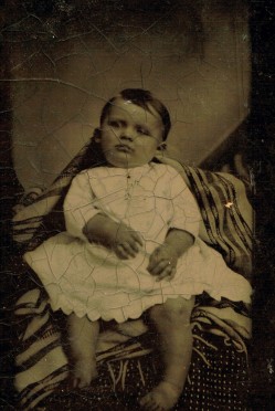 A Victorian post-mortem photograph of a baby