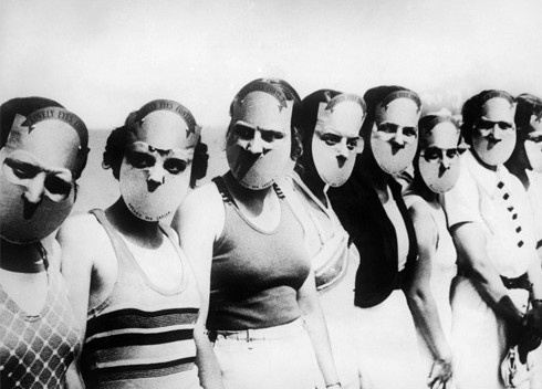 Contestants of the Miss Lovely Eyes competition (Florida, 1930s) pose with creepy face blocking masks.