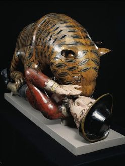 Detail view of Tipus Tiger automaton, showing man arm raised to fend off the tiger