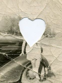 Vintage photograph with head cut out in a heart shape