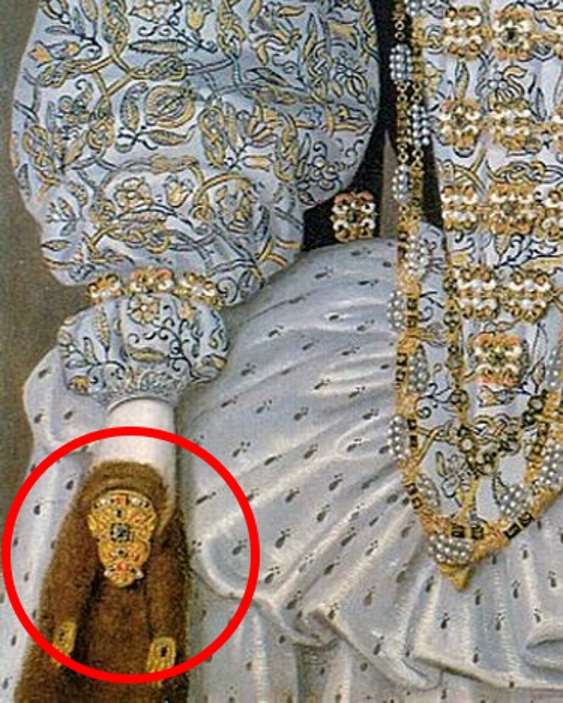 Painting detail showing the jeweled weasel pelt in the hand of an unknown noblewoman